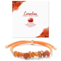 Detail of a handmade carnelian beaded bracelet with a symbolic energy display card - Red Agate