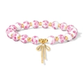 Detail von rosa Keramikperlen und goldenem Schleifenanhänger mit Kristall auf Armband - Rosa Schleife Rosa Floral Stil (CCA895)