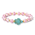Detail der floralen Keramikperlen und des blauen Schildkröten-Anhängers am Armband - Blaue Schildkröte Rosa Floral Stil (CCA896)