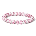 Close-up of white ceramic beads with pink floral patterns on an elastic bracelet - Cherry Blossom Floral Bead Style (CCA901)