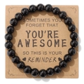 Elastische armband van natuursteen op een inspirerende bruine geschenkkaart - Gepolijst Zwart (YOU RE A W E S O Kaart)