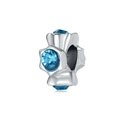 Detailed view of silver-tone floral charm with three deep blue crystal inlays - Blue