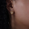 Vintage style gold earrings with sunburst design and oval zircon stone on female model - Sunflower Style (F886)