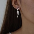Irregular fluid silver earrings featuring a melted metal design and a white pearl accent - Silver
