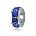 Macro detail of silver charm bead with dark blue square-cut gemstones and polished finish - Sapphire Blue