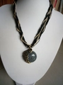 Bohemian retro necklace featuring a grey marble stone pendant with gold ethnic detailing - Black