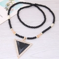 Collana lunga vintage con ciondolo triangolare nero e catena di perline - Stile Triangolare