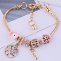 Bracciale bohémien a serpente dorato con occhio greco, albero della vita e ciondolo love - Rosa