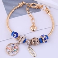 Bracciale stile boho con occhio di Allah, ciondolo albero della vita e perline blu - Blu