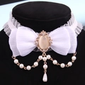 Elegant white lace bow choker with vintage cameo pendant and pearl tassels for women - White with Bowknot