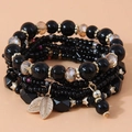 Mehrlagiges Boho-Armband-Set mit goldenen Blattanhängern und schwarzen Kristallperlen - Schwarz