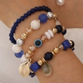 Böhmisches mehrlagiges Perlenarmband-Set mit Muschelanhänger und Evil Eye Charm - Saphirblau