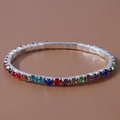 Bracciale tennis con strass multicolore, cristalli vari e montatura a griffe argentata - Multicolore