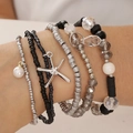 Bracelet multicouche bohème avec breloques d'étoile de mer argentées et perles de cristal gris - Noir