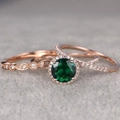 Three-piece rose gold ring set featuring a large green emerald center stone and pavé diamonds - US 7 / Rose Gold Stackable Style