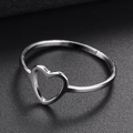 Silver heart cut-out ring with Best Friend engraving on a black leather background - Size 5 / Silver