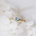 Minimalist heart-shaped blue topaz ring in woven gold band with diamonds for engagement - US 10 / Gold