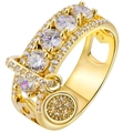 Golden ring with sparkling zircon pavé and a small circular charm on a white background - US 5 / Gold