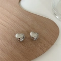Detail of silver heart-shaped earrings on a natural wood tray with white background - Small (1.0cm) / Silver