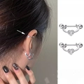 Detail of S925 silver heart stud earring with cubic zirconia and screw ball closure - Pave Heart Style (E908-E)
