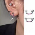 Detail of colorful rainbow rhinestone huggie earrings with secure screw ball back - Rainbow Gradient U-Shape Style (E908-B)