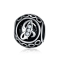 Close-up of ethnic alloy hollow charm bead with letter B and white zircon stones - Letter J