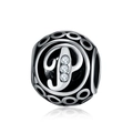Detailed macro view of retro silver hollow charm bead with letter P and zircons - Letter P