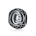 Macro view of a silver hollow charm bead featuring an engraved letter Q with cubic zirconia - Letter Q