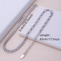 Copper necklace with silver finish, cubic zirconia tennis chain, and handmade tag detail - Silver