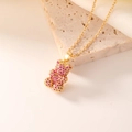 Golden bear pendant necklace with purple pavé zircon crystals on a minimalist chain - Gold Rose Red