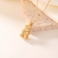 Charming golden teddy bear pendant necklace with sparkling cubic zirconia on silk - 16K Gold White Zirconia
