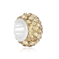 Macro shot of silver pave set bead with champagne crystals for DIY jewelry making - Gold
