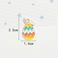 Yellow Easter egg bunny pendant with wave patterns and metal loop for DIY jewelry - Wavy Pattern Rabbit Egg