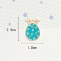 Easter green enamel bunny ear egg charm pendant measuring 2.2 cm by 1.5 cm for DIY jewelry - Blue Polka Dot Rabbit Egg