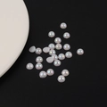 Détail macro de demi-perles acryliques irisées pour décoration de coque de téléphone DIY - Demi-cercle / 6mm
