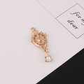 Detailed macro view of a golden vintage crown pendant with teardrop zircon for DIY jewelry - 4# Retro Pendant Shape