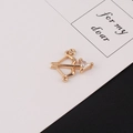 Detailed close-up of a gold-plated bow and arrow pendant with a clear zircon stone - 1# Arrow Shape