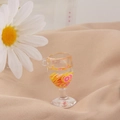 Macro detail of miniature orange fruit drink charm with resin slices and a hanging loop - Citrus Style (3#)