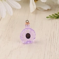 Detail of miniature purple resin XO bottle charm with metallic ring for DIY crafts - Purple