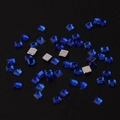 Macro detail of 2mm square royal blue acrylic rhinestones with faceted surface - Mini Size / Sapphire Blue
