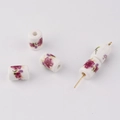 Macro detail of cylindrical ceramic beads with purple floral patterns and threading hole - Vintage Purple Floral Style (9#)
