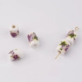 Detailed close-up of cylindrical ceramic beads with purple floral patterns for DIY jewelry - Purple Small Floral Style (10#)