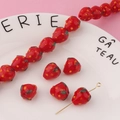 Macro detail of handmade red strawberry glass beads for DIY jewelry and earring crafts - Single Bead / Red