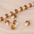 DIY brown glass mushroom beads with white spots and gold metal pins for handmade jewelry - Coffee