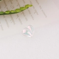 Detail macro shot of iridescent resin heart charm with a shimmering pearlescent finish - Style 1-Heart
