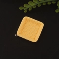Macro detail of square woven resin jewelry pendant in cream yellow for DIY accessories - Square Yellow