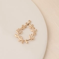 Macro shot of a golden olive leaf wreath pendant for DIY jewelry making on white stone - Olive Wreath Shape (3#)