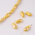 Close-up of yellow fish ceramic beads with glossy finish for DIY jewelry crafting - Yellow
