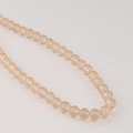 Gros plan détaillé de perles de verre de 8 mm champagne pour la création de bijoux DIY - 18#