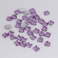 Macro detail of 4mm purple faceted square acrylic rhinestones with silver flat back base - Light Purple